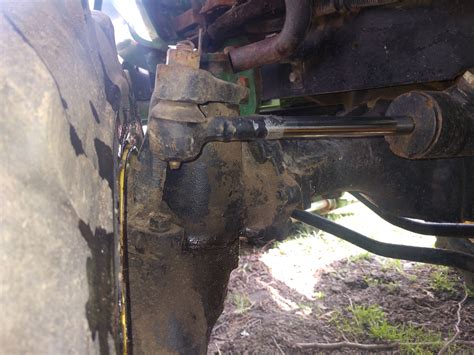 john deere  front left axle leaking  popping  turning green tractor talk