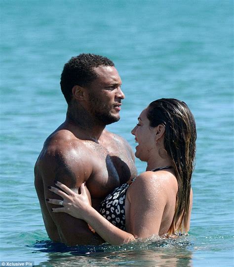 kelly brook flaunts her curves in leopard print bikini as she indulges in pda with fiancé