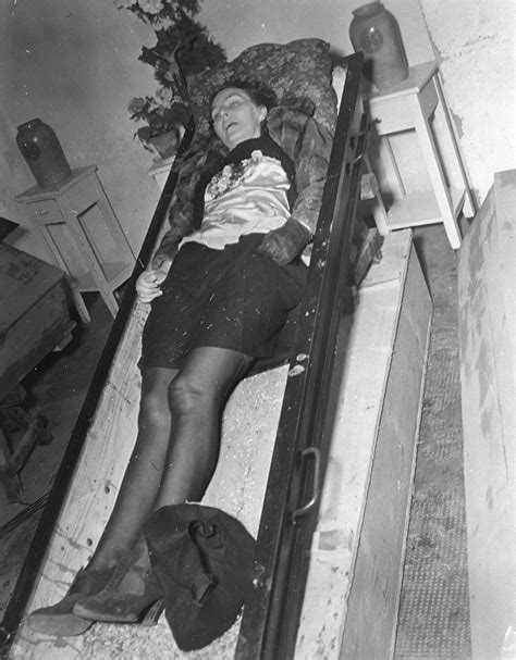 the corpse of a woman lies in an open coffin at the hadamar institute