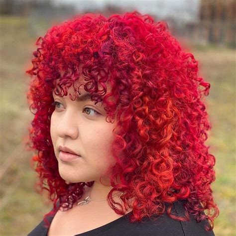 dyed red curly hair