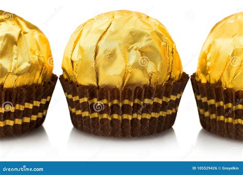 candy  gold wrappers stock photo image