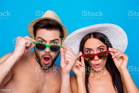 close up photo of two excited and wondered people with open mouths