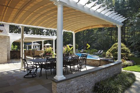 arched retractable awnings  oyster bay shadefx canopies