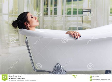 Bathing Woman Relaxing In Bath Smiling Relaxing With Eyes Closed Stock