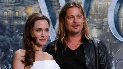 Angelina Jolie Flaunts Sexy Strapless Dress At Brad Pitt S Movie