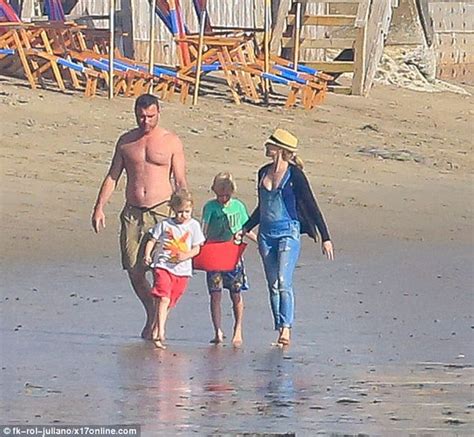naomi watts and shirtless beau liev schreiber go shell picking with