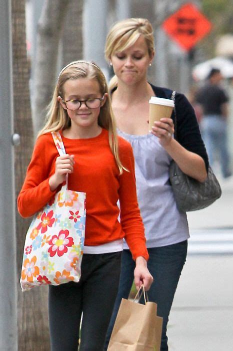 it s crazy how much reese s daughter looks like her talk about a mini me so cute my