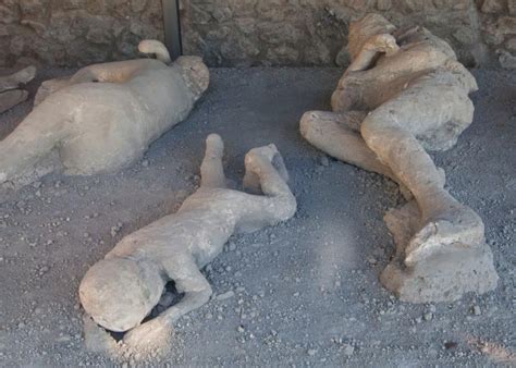 plaster casts of victims bodies at pompeii in italy