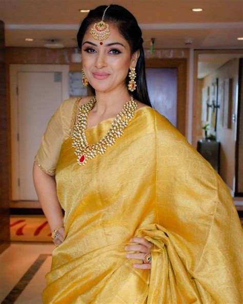 simran rishi bagga festive ready   yellow silk saree paired  beautiful kundan set