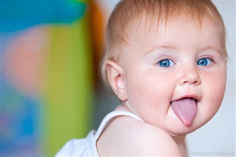 cute baby showing tongue desicommentscom