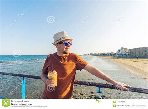 Man With Coffee Frappe Looking The Sea Feeling Free Enjoying Freetime