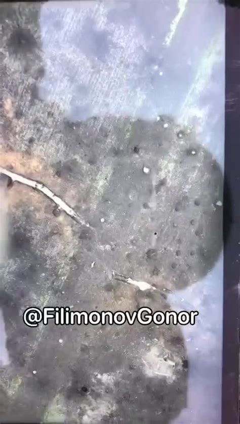 ukrainian drone drops grenade  russian soldiers   trench     drowning