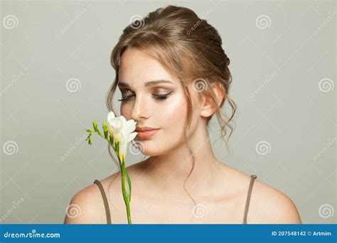 Beautiful Woman With Smelling White Flowers Medicine Skincare And