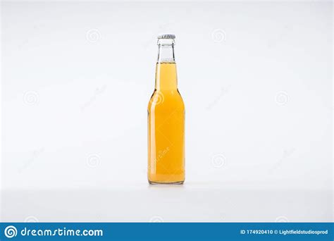 Glass Bottle Of Beer On White Background With Copy Space