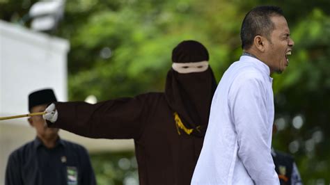indonesian man flogged after breaking adultery law he
