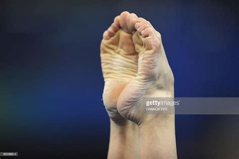 the feet of a german gymnast are seen during the women s photo d