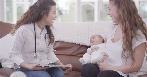 the daughter plays the mother of a pregnant belly dolly shot close up stock footage video
