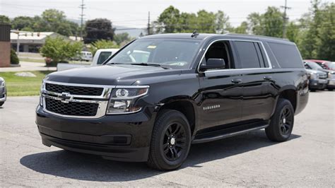 pre owned  chevrolet suburban lt wd