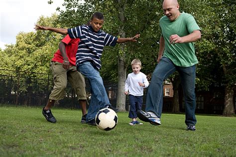 people playing football images