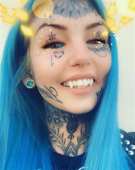 Woman Transforms Herself Into Blue Eyes White Dragon With Fangs