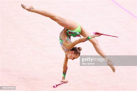 Yana Kudryavtseva Of Russia Performs With The Clubs During The Photo