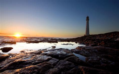 sunset lighthouse beach landscape wallpapers hd desktop  mobile backgrounds