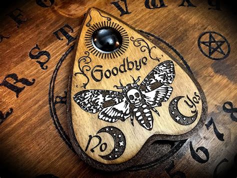 engraved wooden planchette  ouija board deaths etsy