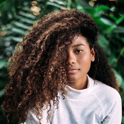 Your Guide To Natural Oils For Curly Hair