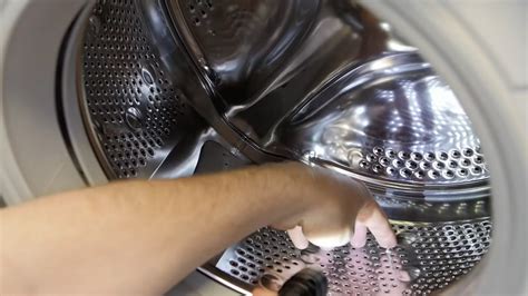 how to remove a stuck item from a washing machine drum espares