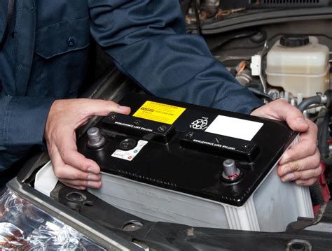 change  car battery  pictures