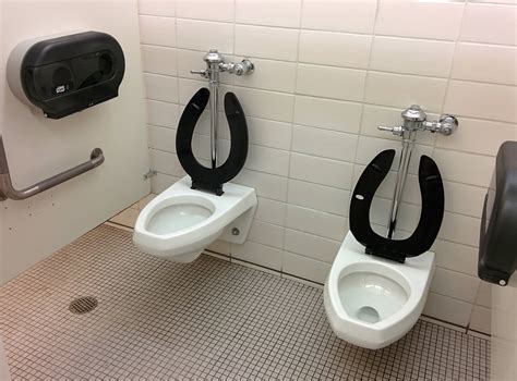 bathroom stall   toilets          shower curtain