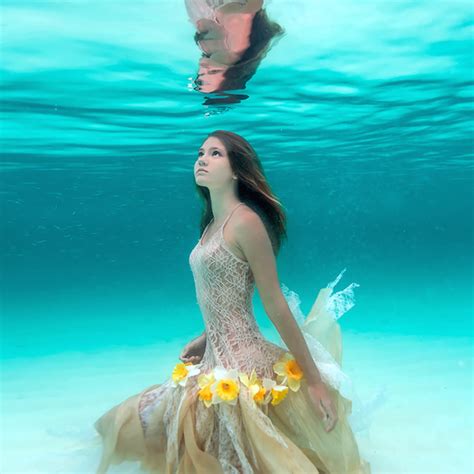 photographer captures her daughter s connection to the sea in graceful underwater portraits