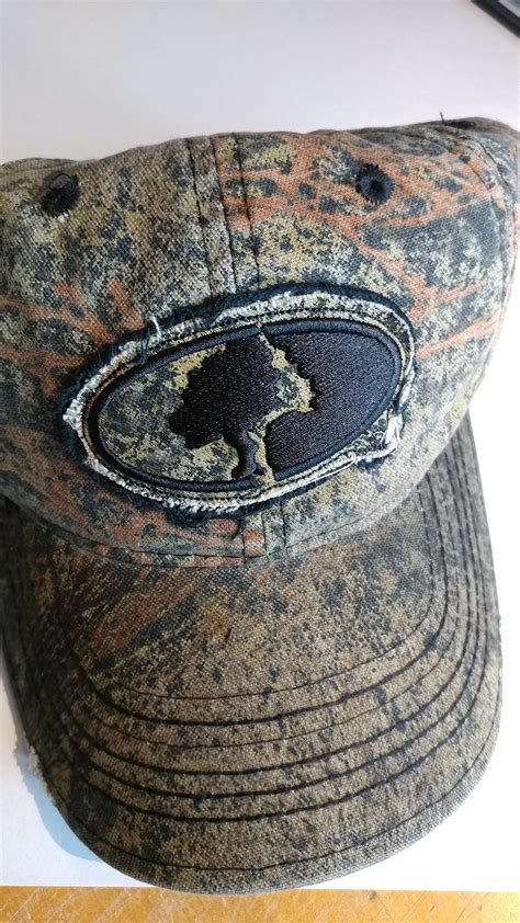 camo cap with mossy oak brush pattern this six panel mossy oak® frayed patch cap is made of a