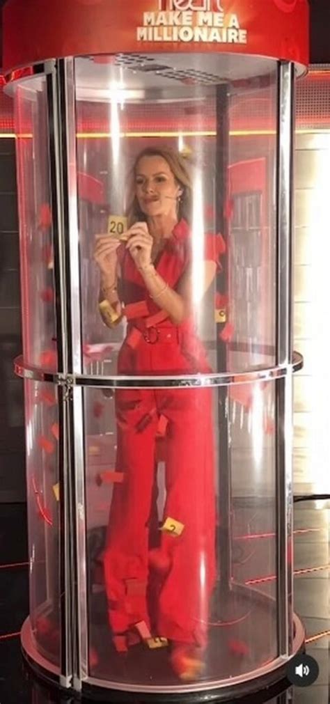 red hot amanda holden shows off her famous curves in tight red jumpsuit