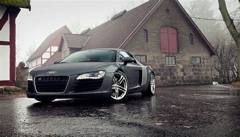 audi r8 with rain soaked street countryside home