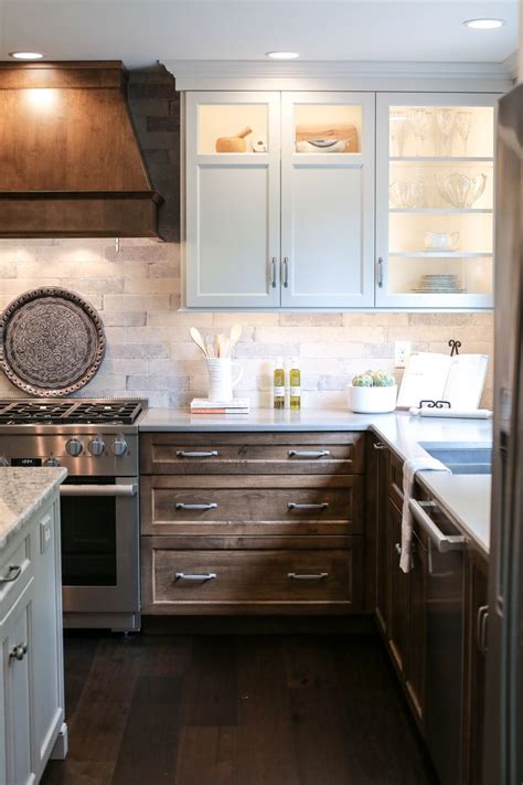 kitchen remodel tile backsplash white painted cabinets stained cabinets quartz