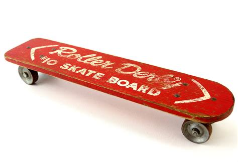 vintage roller derby wood skate board  red  steel wheels cs