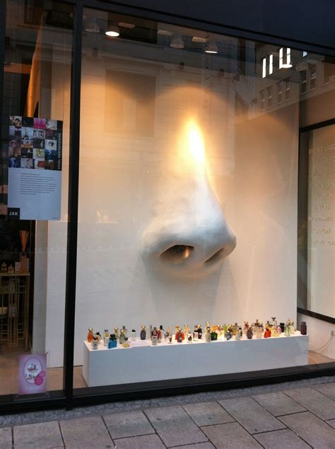 fragrance window display creativeattractive visual merchandising