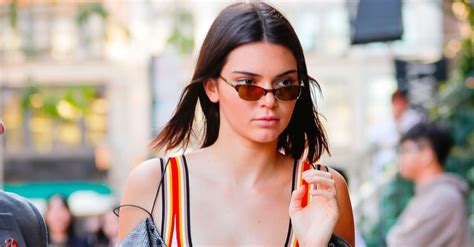 kendall jenner in rainbow bodysuit by kendall and kylie popsugar fashion