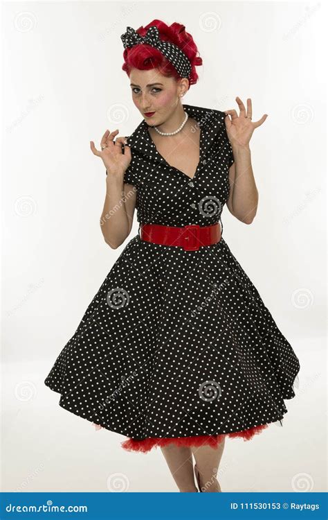 fashion pinup girl in black polka dots dress vintage stock image
