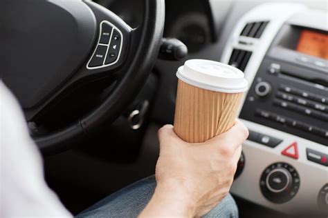 cop pulls driver over for drinking coffee eater