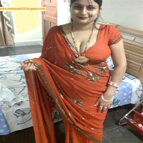 Mallu Aunty In Orange Hot Blouse And Bra Hot Sexy Pictures