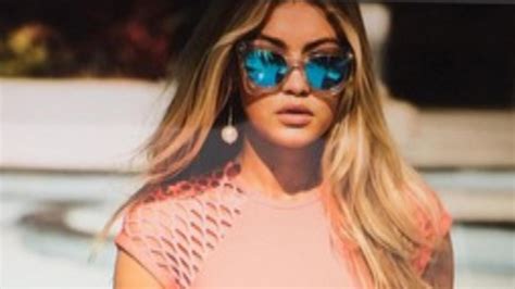 gigi hadid shows an unretouched photo from her swimsuit campaign and