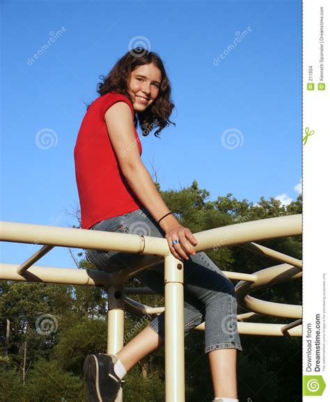 teen on jungle gym stock images image 211934