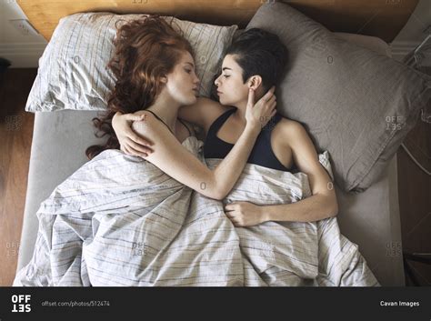 High Angle View Of Romantic Lesbian Couple Looking At Each