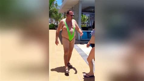 american man parades around pool in borat style mankini after losing bet