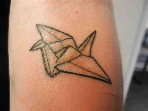 origami bird tattoo   arm