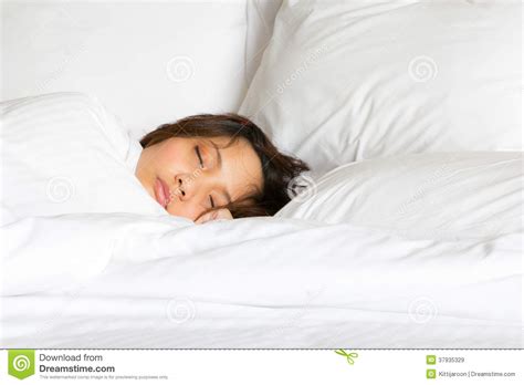 only show face woman in white blanket tucked sleep on the bed royalty free stock images image