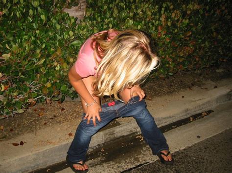 girls pissing on a sidewalk new porn