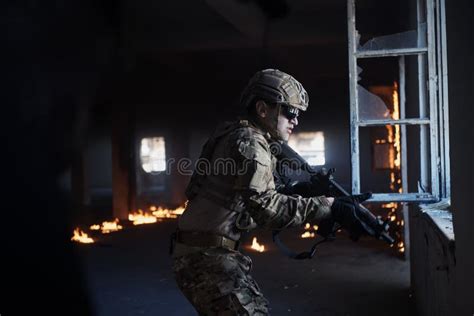 soldier  action  window changing magazine   cover stock photo image  real